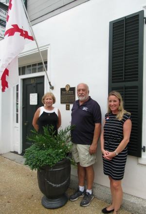 Judy Riggle Poses with Marker Installer Darrel Galles and Historic Preservation Officer Jenny Wolfe