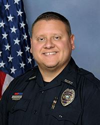headshot of Assistant Chief Jeffrey Collins in a police uniform